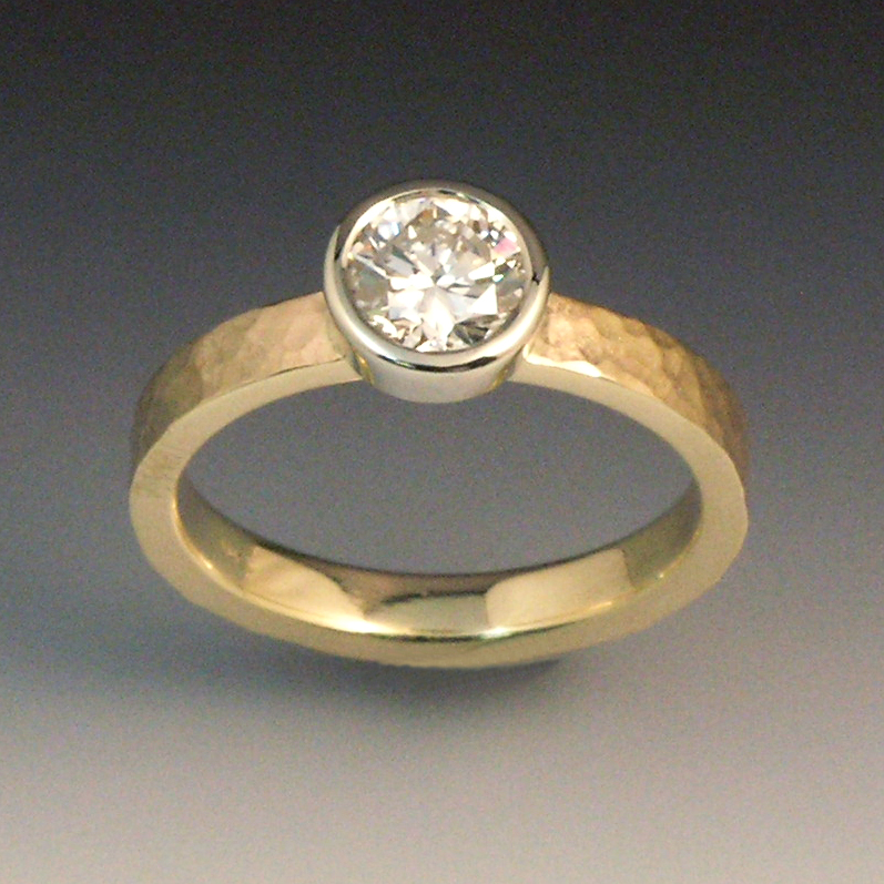 Wedding set featuring 14k yellow gold and bezel set Cognac diamonds